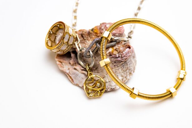 Golden jewelry with decorative seashell on the white background