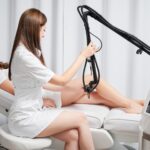 Removal old scars by laser resurfacing in beauty salon.
