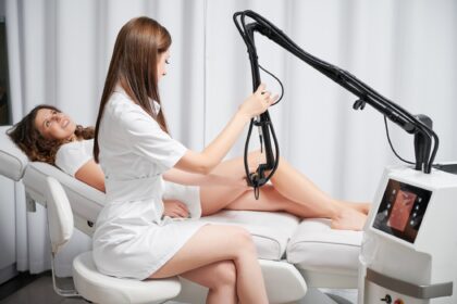 Removal old scars by laser resurfacing in beauty salon.