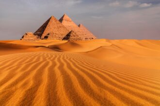 Sunset view of Pyramid complex of Giza, in Cairo, Egypt