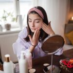Teenage girl doing her skin care routine.